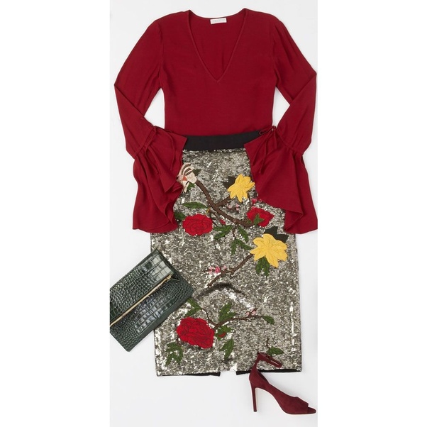 Try bell sleeves and a sequined pencil skirt