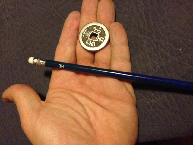 Balance Coins On Pencil