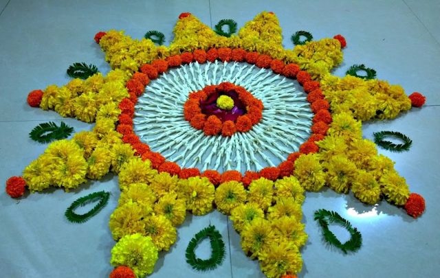 Sunshine Rangoli Design Using Marigold Flowers