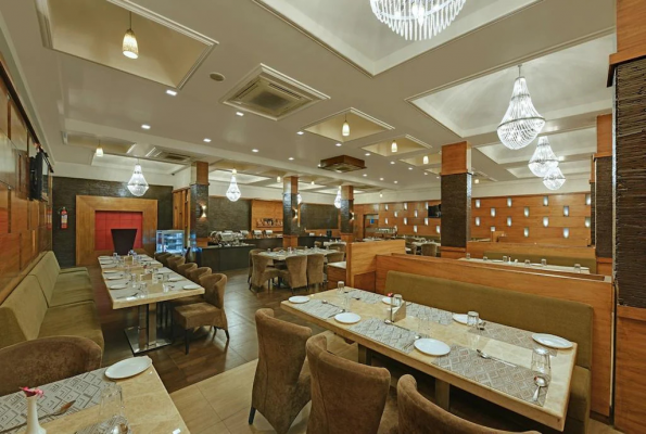 Foodies Multi Cuisine Restaurant at Edhatu Valley View Resort & Spa