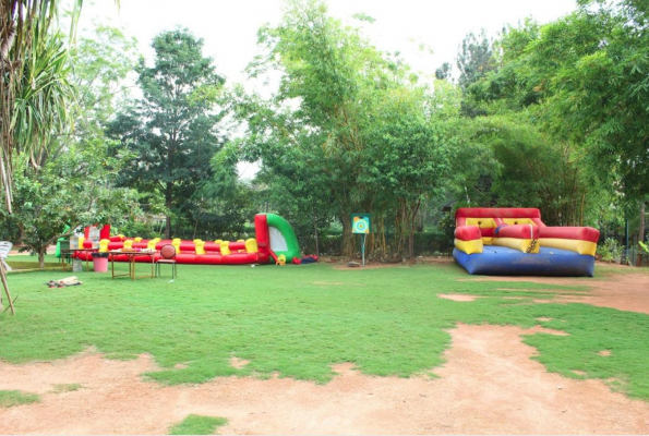 Play Area and Lawn at Chairmans Jade Club And Resort