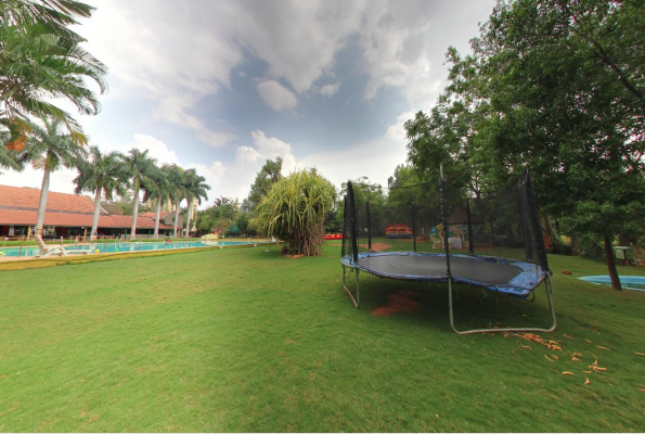 Play Area and Lawn at Chairmans Jade Club And Resort