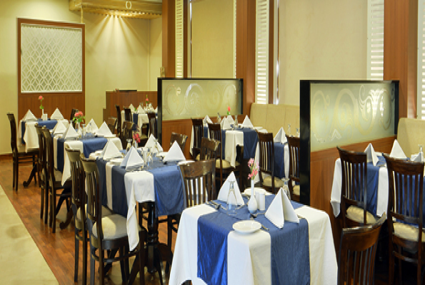 Restaurant at Hotel Madhuram Royale