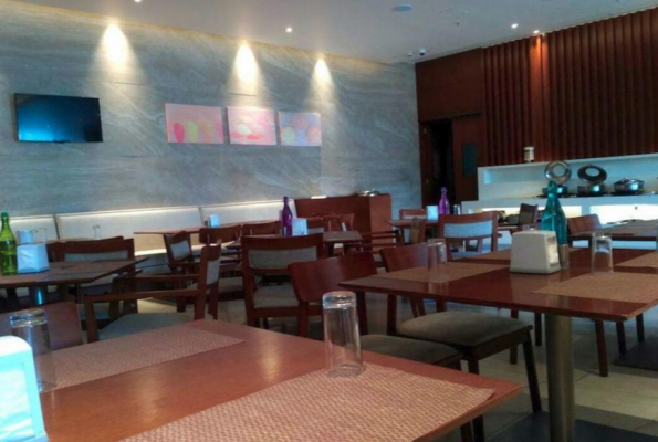 Multi Cuisine Restaurant & Bar at Bizz Tamanna Hotel