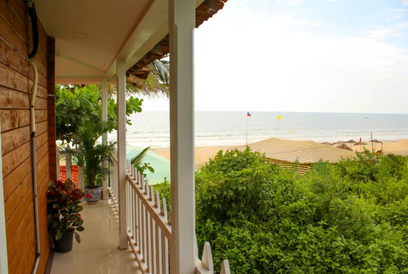 Poolside at Peles Windsong Wooden Cottages