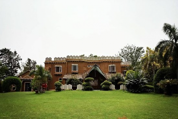 Lush Green Lawns at Surjivan Resort