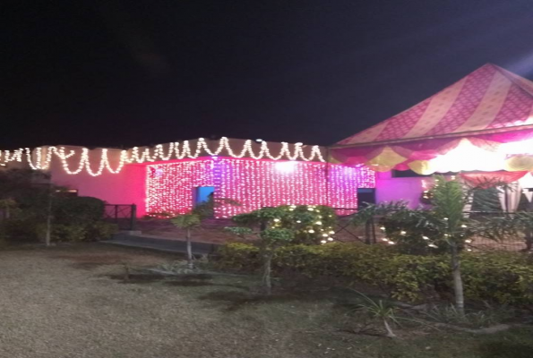 Lawn and Hall at Manohari Farms And Banquet