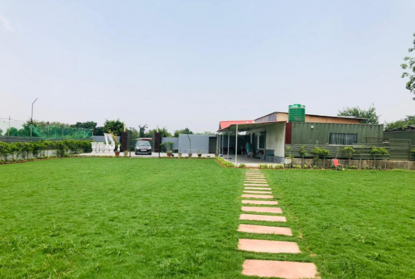 Pool With Lawn at Tosh Resort And Farm House