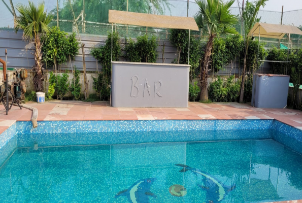 Pool With Lawn at Tosh Resort And Farm House