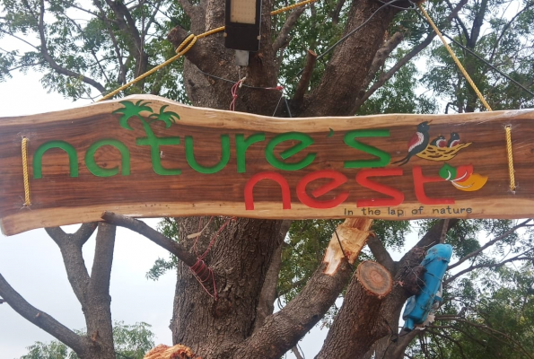 Under Tree Shade at Natures Nest Farm And Resort