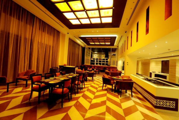 Cosmo Restaurant & Lawn at Golden Galaxy Hotels & Resort