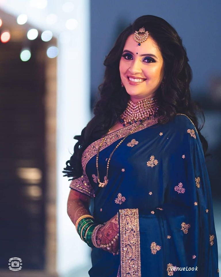 What simple makeup look goes with a dark blue and green saree? - Quora