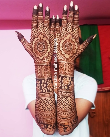 Varshika Mehandi Designs