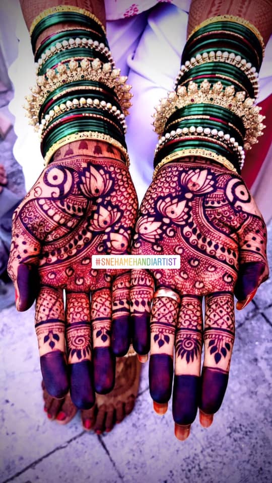 This bride's King and Queen Mughal mehendi is trending and you can't miss  the henna design | The Times of India