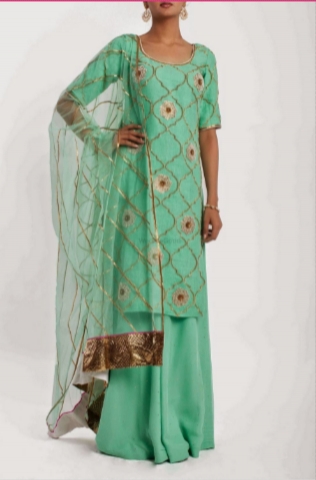 Tisha by Tisha Saksena