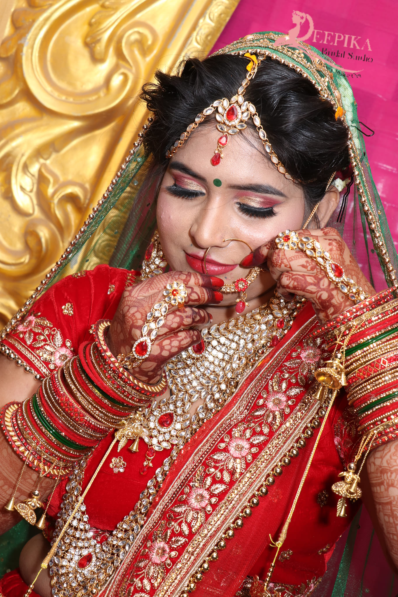 Young Beautiful Bride Of Indian Ethnicity Posing For Photographer Near  Mirror Stock Photo - Download Image Now - iStock
